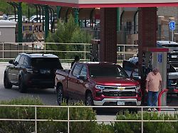 motorists fill up the tanks of their vehicles at a murphy express gasoline station thursday may 14 2026 in centenial colo