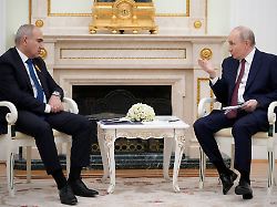 russian president vladimir putin talks to armenian prime minister nikol pashinyan during their meeting at the kremlin in moscow russia april 1 2026