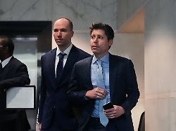 sam altman right and openai president greg brockman center arrive at the u s district court in oakland calif thursday april 30 2026 ap photo godofredo a