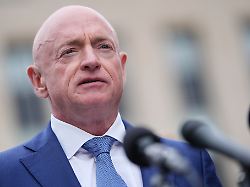 sen mark kelly d ariz speaks with reporters outside the e barrett prettyman federal courthouse thursday may 7 2026 in washington