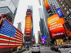 times square screens display the announcement of cerebras systems artificial intelligence chip maker during the company s ipo at the nasdaq market site in new york city u s may 14 2026