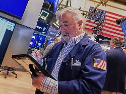 trader edward mccarthy works on the floor of the new york stock exchange wednesday may 13 2026