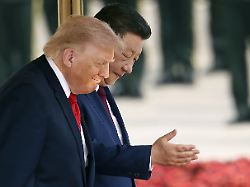 u s president donald trump front alongside chinese president xi jinping attends a welcome ceremony at the great hall of the people in beijing on may 14 2026