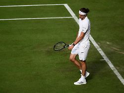 260630 alexander zverev of germany looks dejected as he competes in a first round mens singles match during day 2 of wimbledon on june 30 2026 in london