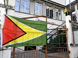 a national flag of guyana displayed at a school in georgetown guyana on jan 5 2024 venezuela claims about 70 of guyana s territory as its own