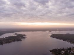 aerial view of blackwater river interstate 10 bridge over a milton florida waterway at sunrise