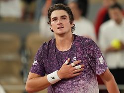 brazil s joao fonseca reacst after winning the fourth round tennis match against norway s casper ruud at the french open in paris monday june 1 2026