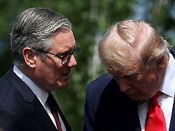 british prime minister keir starmer and u s president donald trump speak as they wait for a family photo during the g7 summit in evian les bains france june 16 2026
