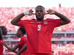 canada s cyle larin 9 celebrates after scoring his sides first goal of the game in the second half of the world cup group b soccer match between canada and bosnia friday june 12 2026 in toronto 1