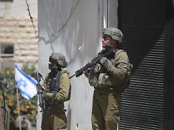 israeli soldiers stand on a street during an israeli army raid in the northern west bank city of nablus in nablus west bank palestine on april 23 2026