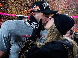 kansas city chiefs tight end travis kelce and taylor swift kiss after the afc championship nfl football game against the buffalo bills in kansas city mo jan 26 2025