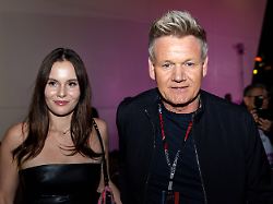 las vegas nv november 18 gordon ramsey and his daughter holly walk the paddock before the f1 las vegas grand prix on saturday november 18 2023 on the las vegas street circuit in las vegas nv