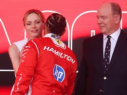 lewis hamilton of ferrari princess charlene of monaco and prince albert ii of monaco on the podium after formula 1 monaco grand prix at the circuit de monaco in monte carlo on june 7th 2026