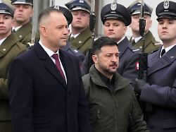 polish president karol nawrocki left and ukrainian president volodymyr zelenskyy attend an official welcome ceremony before their meeting at the presidential palace in warsaw poland friday dec 19 2025