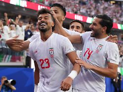 ramin rezaeian l and saman ghoddos r of iran celebrate a goal during a group g match of the 2026 fifa world cup between iran and new zealand at sofi stadium in los angeles usa 15 june 2026