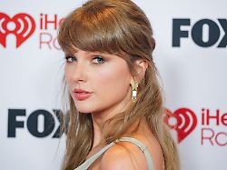 taylor swift arrives at the iheartradio music awards on thursday march 26 2026 at the dolby theatre in los angeles