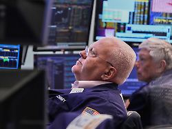 trader thomas ferrigno left works on the floor of the new york stock exchange monday june 15 2026