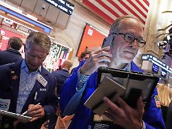 traders robert charmak left and mark puetzer work on the floor of the new york stock exchange thursday june 25 2026