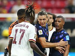 uruguay s agustin canobbio and nicolas de la cruz argue with spain s nico williams 17 in the closing minutes of a fifa world cup match at guadalajara stadium in guadalajara mexico on friday june 26 2026
