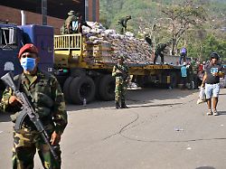 venezuelan military personnel distribute aid to people affected by earthquakes that hit the country in la guaira venezuela june 26 2026