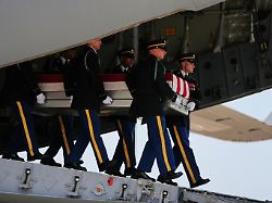 a u s army carry team moves a transfer case containing the remains of 1st lt tyler james feehan of ewa beach hawaii wednesday july 22 2026 at dover air force base del