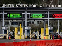 a car waits at the united states and canada border in surrey b c on tuesday march 4 2025