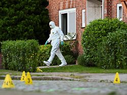 a forensic expert works at the scene after police said suspects have been detained following a deadly shooting at a youth welfare facility in the northern town of stade germany june 29 2026