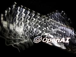 a laptop keyboard and openai logo displayed on a phone screen are seen in this multiple exposure illustration photo taken in poland on may 17 2026
