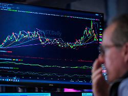 a trader works on the floor of the new york stock exchange thursday july 30 2026 in new york