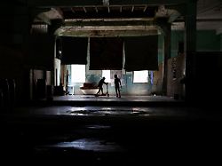 children play inside their home during a nationwide blackout after cuba s national power grid collapsed marking the third major outage in nine days in havana cuba july 14 2026