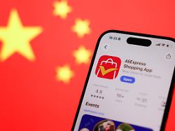 chinese flag displayed on a screen aliexpress on app store displayed on a phone screen are seen in this illustration photo taken in krakow poland on july 1 2026