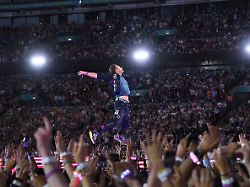 coldplay perorming at wembley stadium london england august 22 chris martin of coldplay performs during the music of the spheres world tour at wembley stadium on august 22 2025 in london england 1