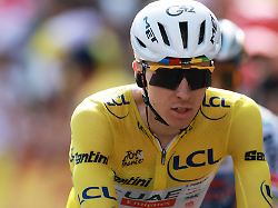 cycling tour de france stage 9 malemort to ussel ussel france july 12 2026 uae team emirates xrg s tadej pogacar wearing the yellow jersey during the finish of stage 9 reuters stephanie lecocq