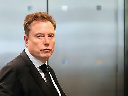 elon musk arrives at the u s district court in oakland calif tuesday april 28 2026 ap photo godofredo a