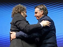 file argentina s president javier milei left hugs brazilian former president jair bolsonaro during cpac brasil 2024 a conservative event in balneario camboriu santa catarina state brazil july 7 2024