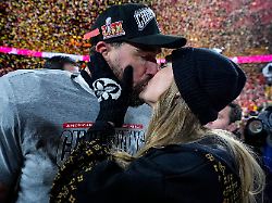 file kansas city chiefs tight end travis kelce and taylor swift kiss after the afc championship nfl football game against the buffalo bills jan 26 2025 in kansas city mo