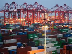 gantry cranes stand near stacked shipping containers at yangshan port outside shanghai china may 7 2026