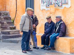group of elderly sardinian villagers talking on the street sardinia italy may 5 2018 group of male elderly sardinian villages talking on the street