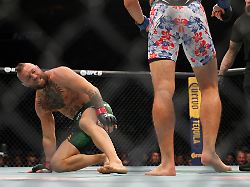 jul 11 2026 las vegas nevada usa conor mcgregor left attempts to get up after falling against max holloway during ufc 329 at t mobile arena mandatory credit mark j