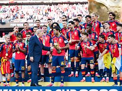 july 19 2026 east rutherford new jersey united states rodri of spain c is presented the fifa world cup winneras trophy by u s