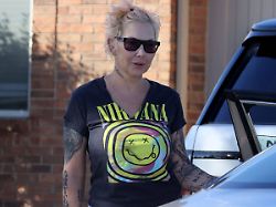 kim mathers kim mathers the ex wife of rapper eminem is seen outside her home in chesterfield mi on october 14 2025 mathers is pictured with pink hair wearing a nirvana t shirt