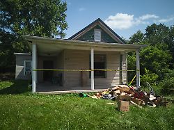 police tape surrounds a home where authorities say they removed 16 children and arrested four adults in hamden ohio wednesday july 1 2026