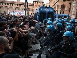 protesters clash with riot police during a protest following the death of abderrahim fakir after he was restrained by police during an attempted detention in bologna italy july 20 2026