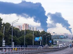 smoke billows after ukrainian drone attacks according the local authorities in the course of the russia ukraine conflict in podolsk moscow region russia july 20 2026