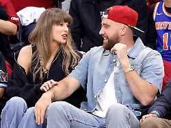 taylor swift and travis kelce talkd during the first quarter of the cleveland cavaliers eastern conference final game against the new york knicks in cleveland ohio saturday may 23 2026 3