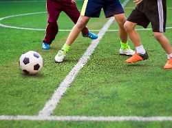 the footballers are competing in sports of elementary school