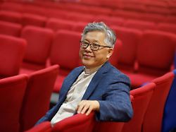 the head pastor of the zion church in beijing jin mingri poses for picures in the congregation hall of the unofficial protestant house church in beijing china august 28 2018 picture taken august 28 2018