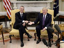 united states president donald j trump shakes hands with secretary general jens stoltenberg of nato in the oval office of the white house in washington dc april 12 2017