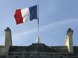a photo showing the french flag flying over the elysee palace the official residence of the french president 17 october 2006 in paris