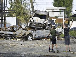 children view the destruction after a russian missile attack in kyiv ukraine on 13th september 2025